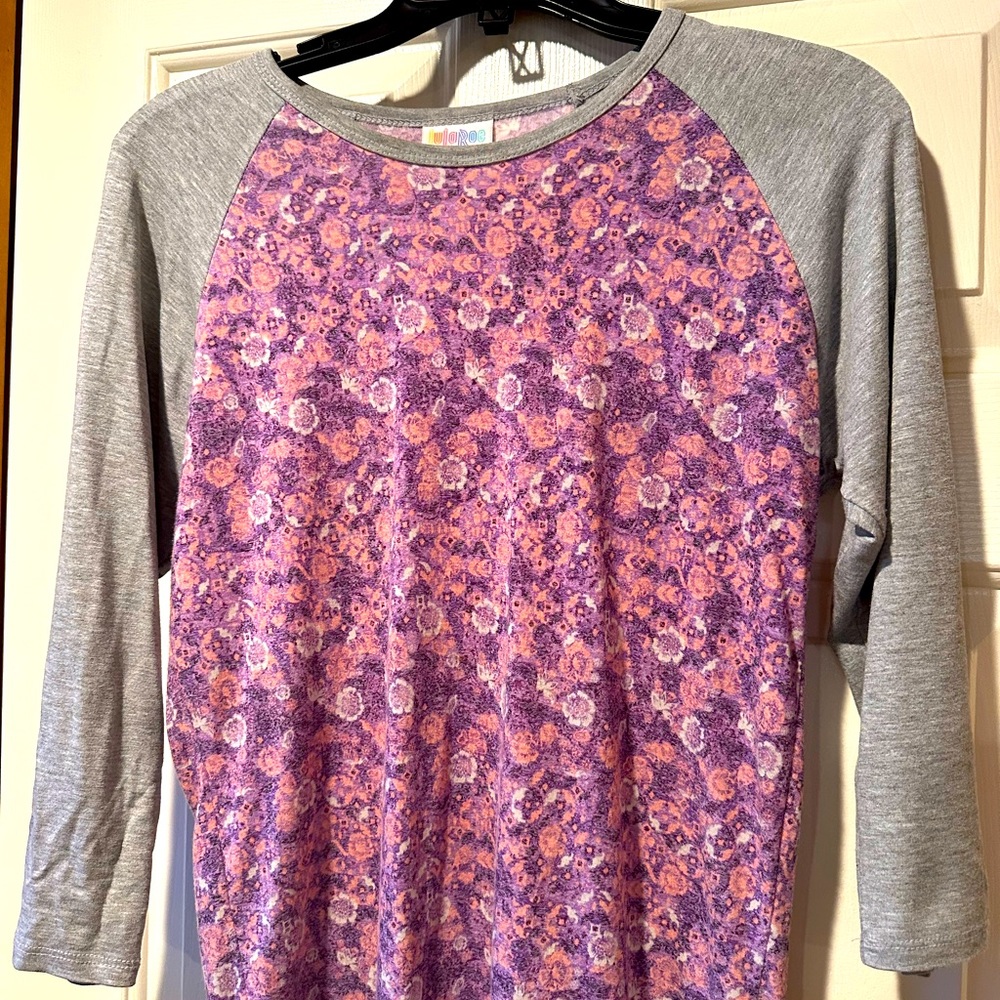 Woman’s XS LuLaRoe gray and multi colored blouse
